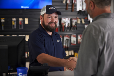 Coburn Salesmen With Customer